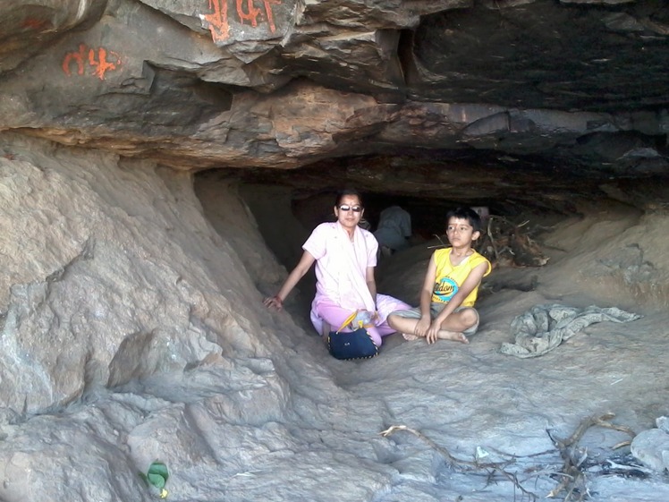 Dr. MALVIKA & Master KUBER  in the cave  where Lord Hanuman was born, Anjaneri