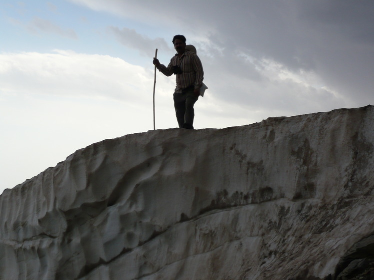 Snow wall on the peak shyrbad, Mount Binalud