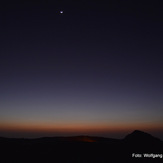 new moon over Erta Ale's magma lake, minutes before sunrise