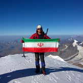 Iran flag on the top of the kazbek peak, Kazbek or Kasbek