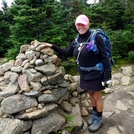 Aug. 23/ 2018. Brisk wind. Trail to summit flowing with rain water.