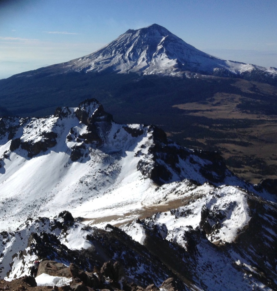Summit Iztaccihuatl, backgroung the Popocatepetl
