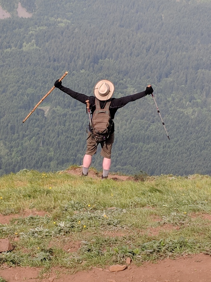 Hiker enjoys summit views, Dog Mountain