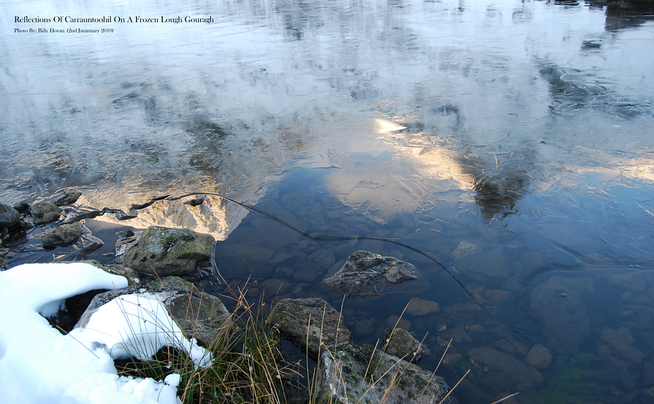 Reflections Of Carrauntoohil On A Frozen Lough Gouragh