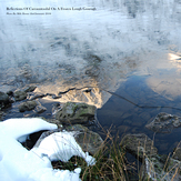 Reflections Of Carrauntoohil On A Frozen Lough Gouragh