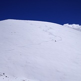 Snow surfing a cone near the summit, Mauna Kea