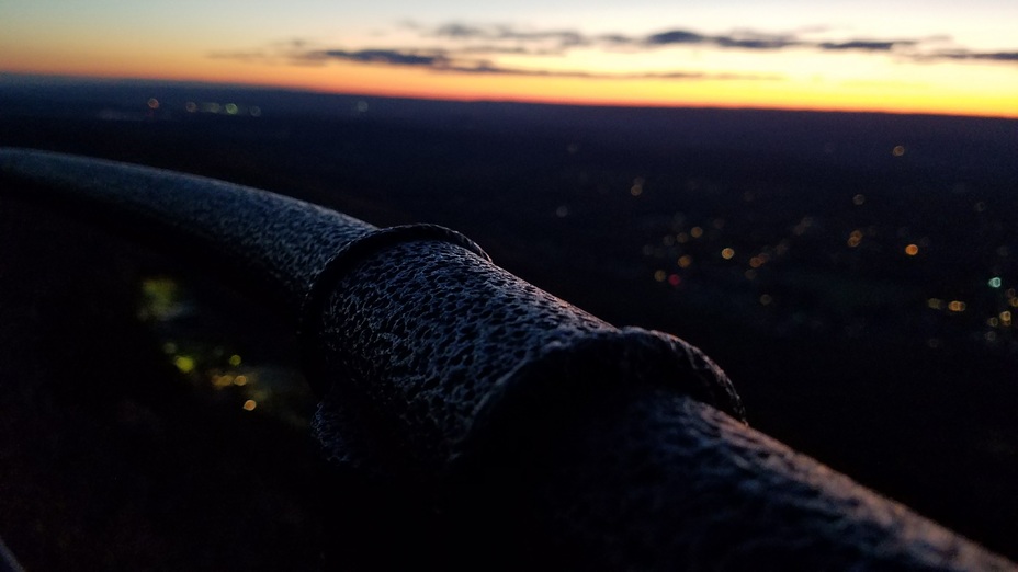 Railing atop Mt Tom, sunset in the distance, Mount Tom (Massachusetts)