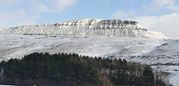 Snow covered Pen-y-ghent photo