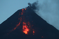 Day time Lava Flow at the Mayon Volcano photo