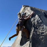 Going for the 5.8 half-dyno on toprope, Thunderbolt Peak