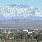 Why no snow on the tip of four peaks?