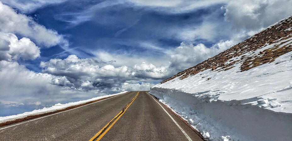 Snow-Cleared Road on Pikes Peak Highway in Late Spring
