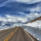 Snow-Cleared Road on Pikes Peak Highway in Late Spring