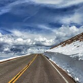 Snow-Cleared Road on Pikes Peak Highway in Late Spring