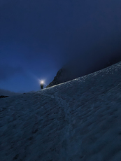 Alpspitze winter, snow patch crossing at night photo
