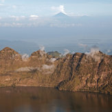 view over the crater lake to Agung on Bali, Mount Rinjani