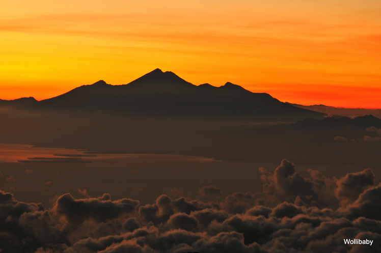 Rinjani at a distance of 106 km to the east,  before sunrise, Mount Agung